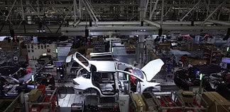 Tesla Q4 2025 Earnings Beat: Profit Dip, Optimus Pivot Tesla